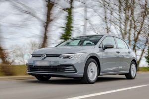 Volkswagen Certified Body Shop - Grey VW Sedan Driving
